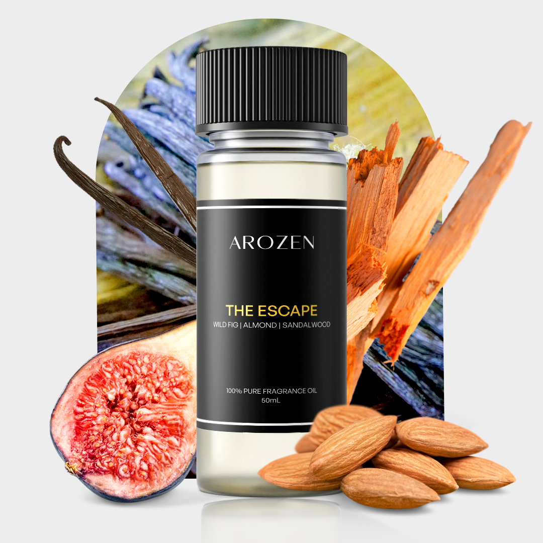 
                  
                    Arozen’s THE ESCAPE Fragrance Oil is showcased with figs, almonds, sandalwood, and green leaves in the background, hinting at its enticing scent notes.
                  
                